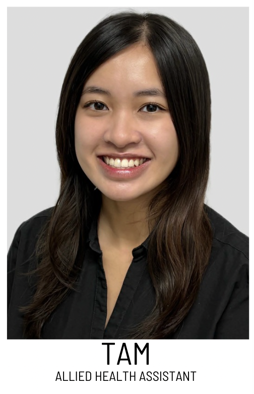 Portrait of Tam, Allied Health Assistant, smiling in a black top against a light gray background.
