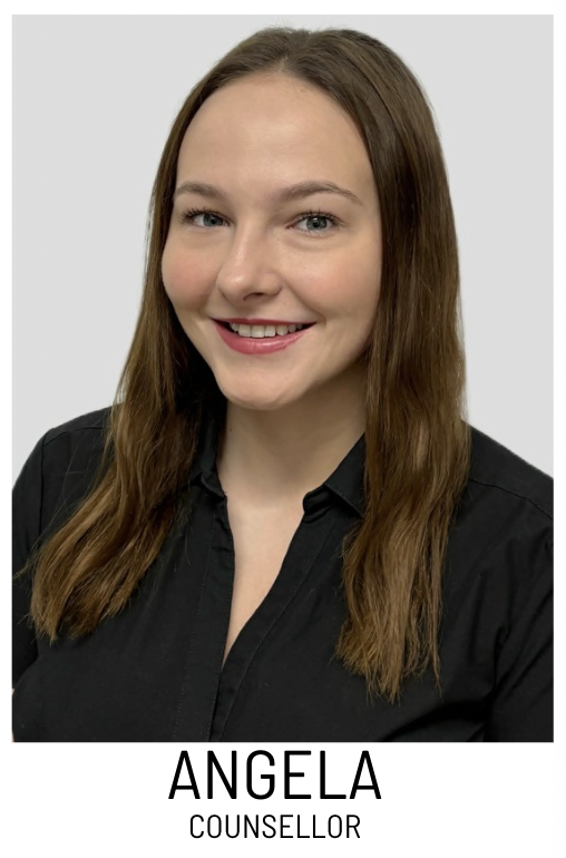 Portrait of Angela, a counsellor, smiling at the camera with a black collared shirt against a light gray background.