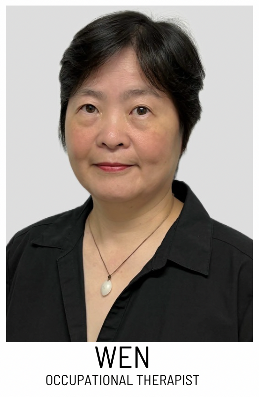 Portrait of Wen, an occupational therapist, facing the camera and wearing a black blouse with a pendant necklace.