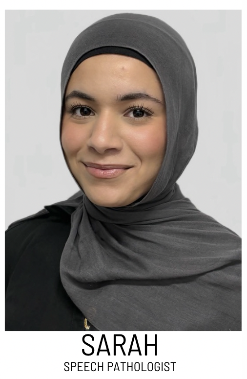 Portrait of Sarah in a gray hijab smiling for a professional headshot (speech pathologist).