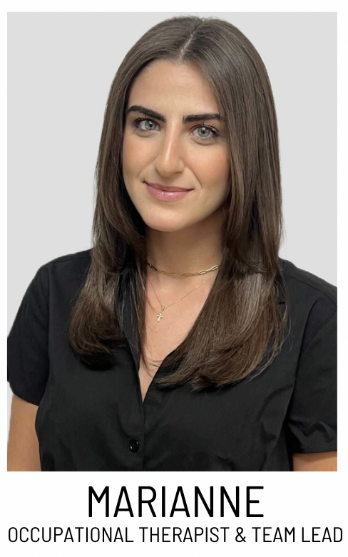 Portrait of Marianne, occupational therapist and team lead, smiling in a black blouse for the staff profile.